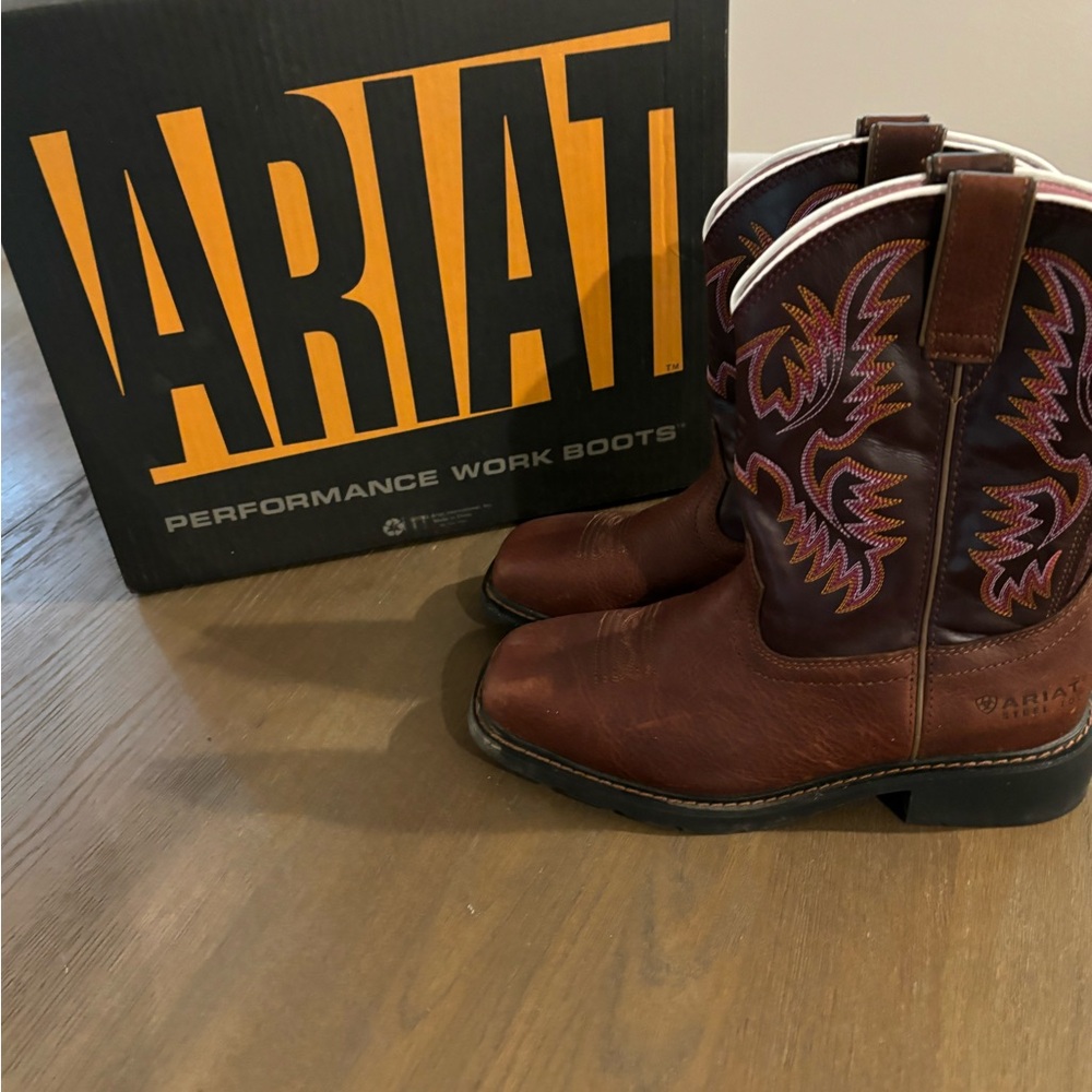 Ariat steel toe cowboy boots.